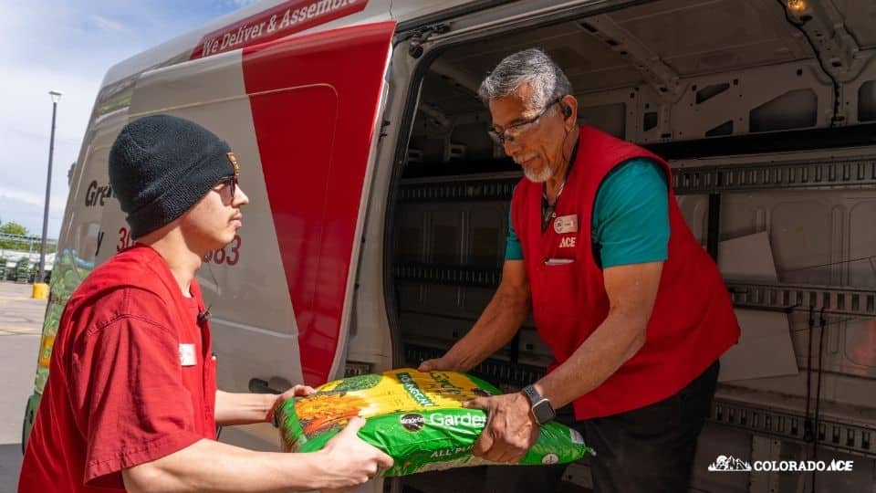 Ace team members stocking the delivery truck from Colorado Ace team