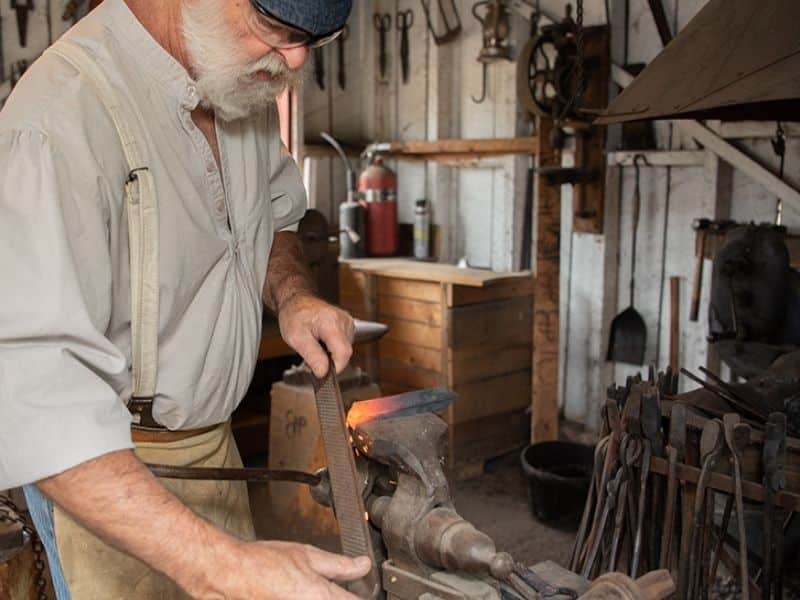Blacksmithing in the park in Golden, Colorado.