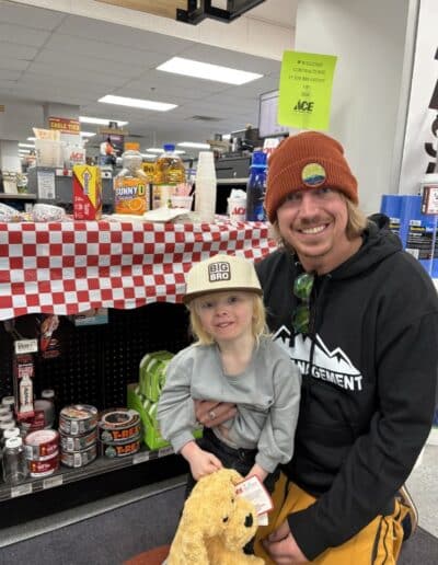 Local contractor and child attending B2B Breakfast at Colorado Ace Summit County