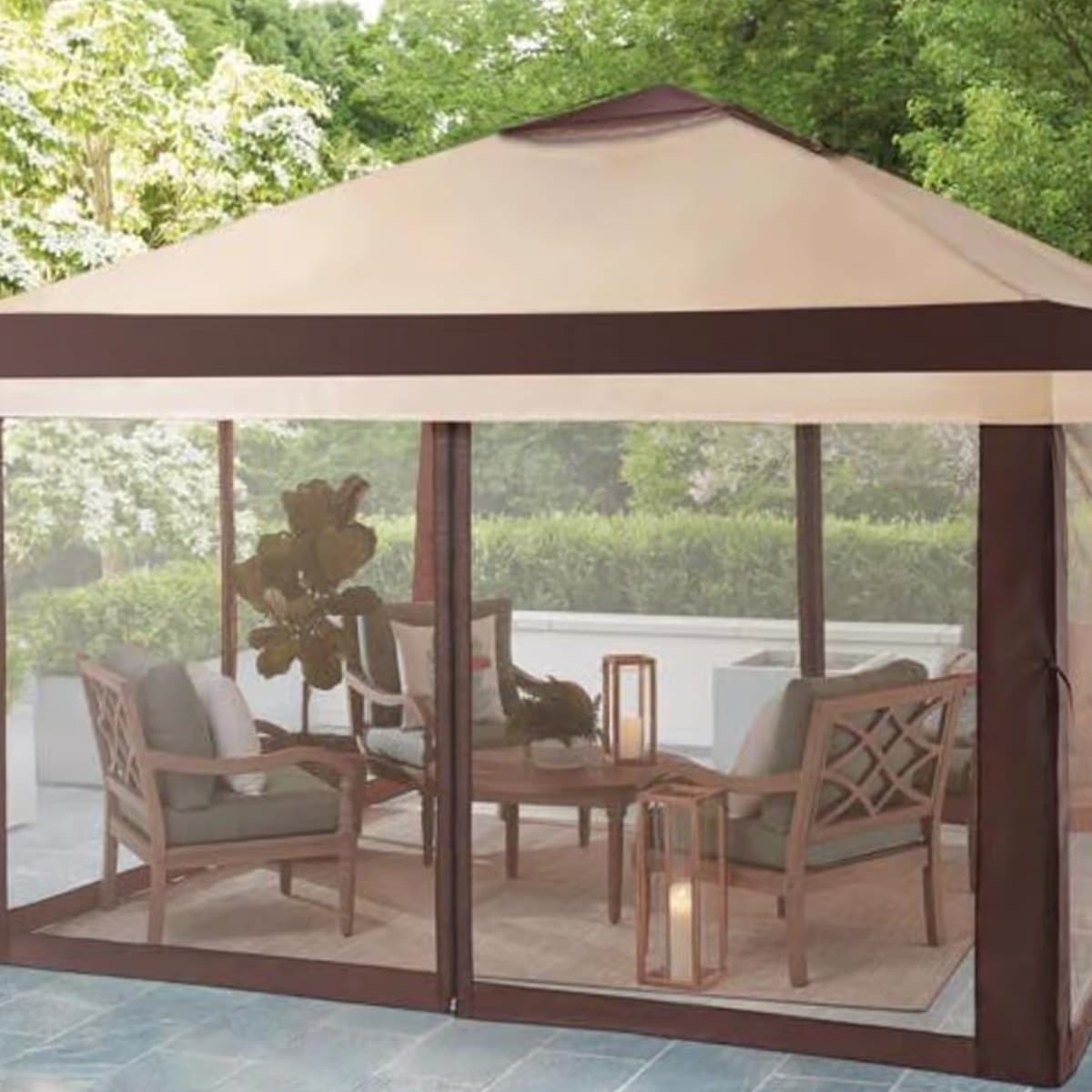 Outdoor gazebo with seating area creating shaded backyard living space